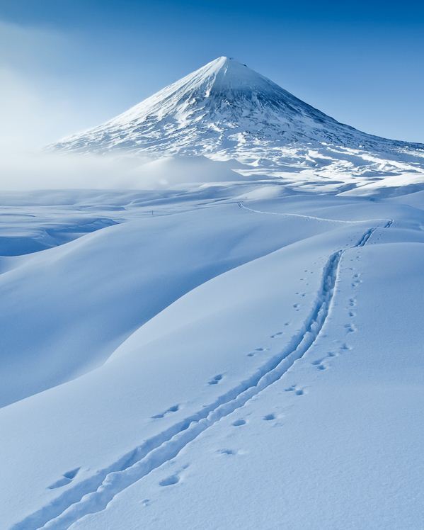 Path to snow-covered Klyuchevsky Volcano, Kamchatka, Russia