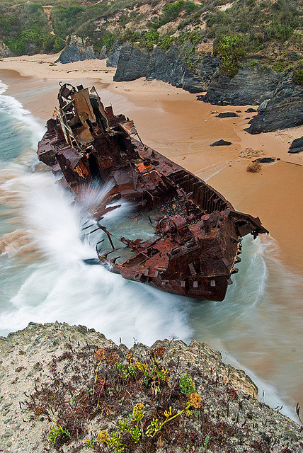 Shipwreck on the coast in Vila Nova de Milfontes, Portugal