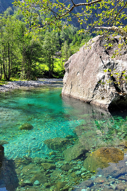 Emerald waters in Val di Mello, Lombardy, Italy